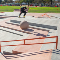 A boy doing a trick at a skate park used as an example of what will be available once the Campus Park improvement project is completed.