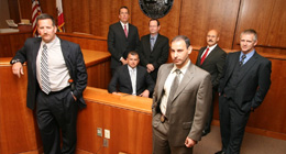 Group shot of the major crimes unit in a court room.