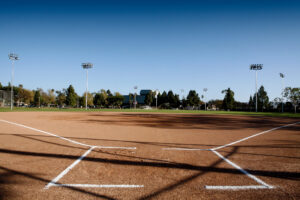 View front behind home plate on a softball field at Community West park.