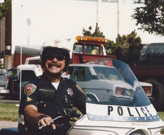 Officer Bryan MacDonald on motorcycle detail, circa 1980's. MacDonald later served on Oxnard's City Council.